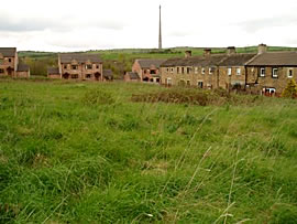 Photo of local residential area with Emley Moor TV mast in background